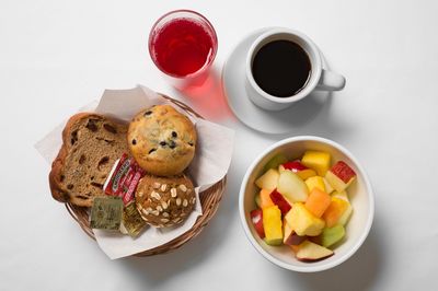 Muffins, fruit, coffee, juice
